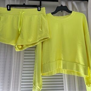 Brand new (never worn/no tags) Lululemon sweatshirt and shorts - neon yellow